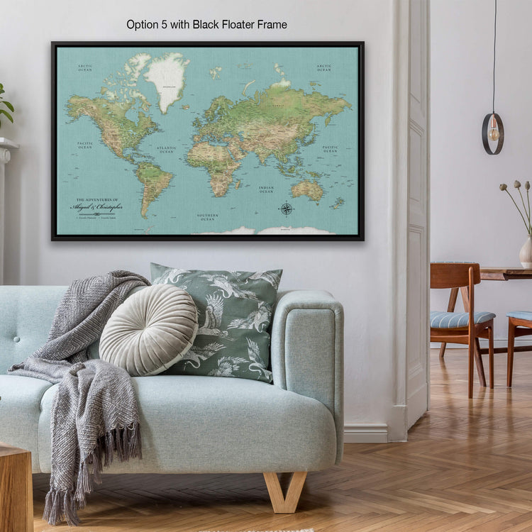 a living room with a couch and a map on the wall