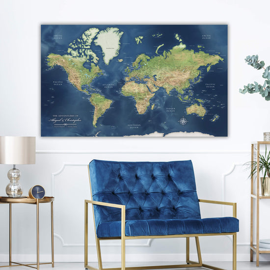a blue chair in front of a large map of the world
