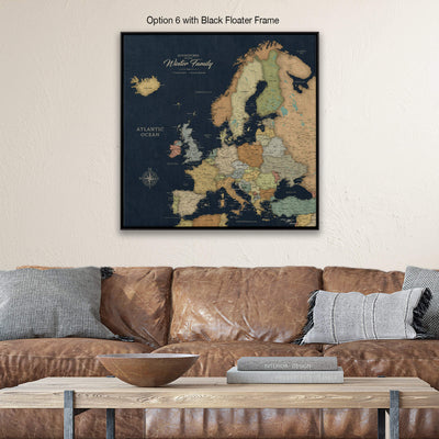a large, detailed map of Europe displayed on a wall above a brown leather couch.