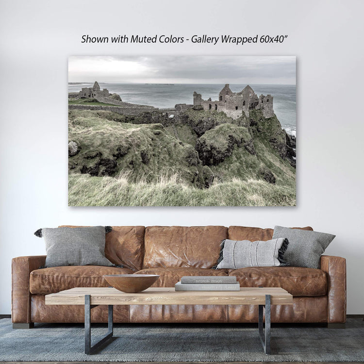 a living room with a couch and a painting on the wall