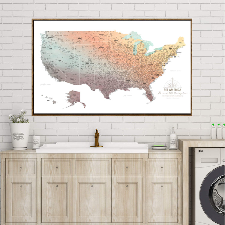 a large map of the United States hanging on a wall above a wooden cabinet with a sink.