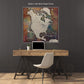 a large, colorful map of North America on the wall above a wooden desk with a laptop and a white chair.