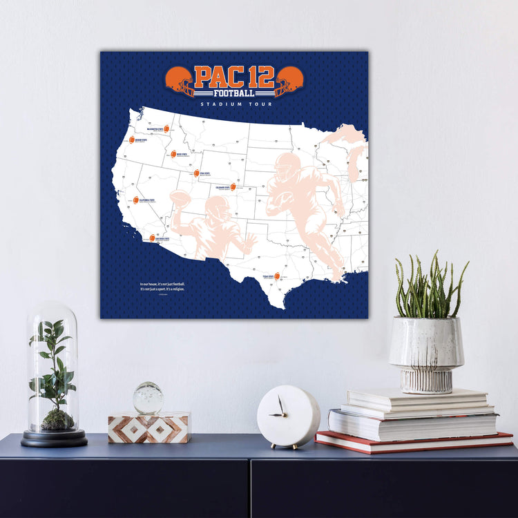 a wall-mounted map of the United States with various locations marked, including a football stadium. Below the map, there is a collection of decorative items such as a glass dome, a clock, and a stack of books.