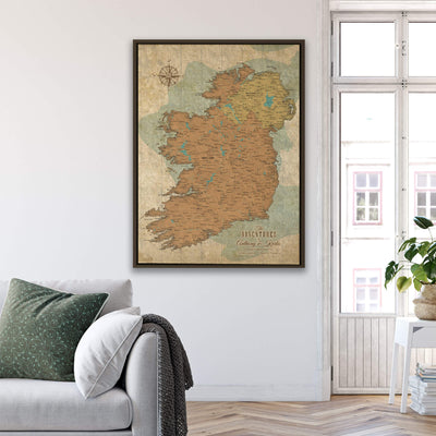 a living room with a couch and a large map on the wall