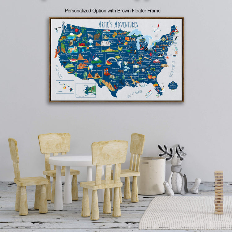 a large, colorful map of the United States with various landmarks and locations marked, displayed on a wall above a table with chairs.