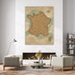 a living room with a large map of France hanging on the wall above a fireplace. The room has a cozy and inviting atmosphere, with a coffee table in the center and two chairs placed around it. There are also several books and decorative items in the room, creating a comfortable and personalized space.