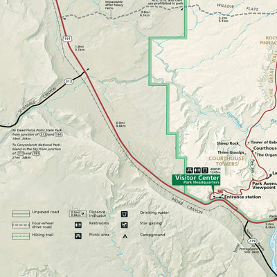 The image is a detailed map of a mountainous region, showing various landmarks, roads, and trails. It includes a visitor center, a parking area, and a trail for hiking. The map also provides distances and directions to different points of interest, such as the visitor center and the parking area. The image is not a collage of multiple images, but rather a single, comprehensive map that provides a clear and accurate representation of the area.