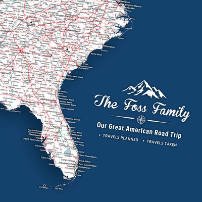 The image is a detailed map of the United States, with various states and cities clearly marked. The map is set against a blue background, and there is a logo or text in the bottom right corner that reads "The Foss Family Our Great American Road Trip TRAVELS PLANED TRAVELS TAKEN".