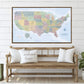 a large framed map of the United States with a wooden bench and pillows in front of it, creating a welcoming atmosphere.