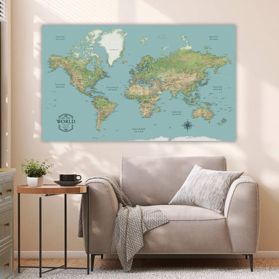 a living room with a couch and a map on the wall