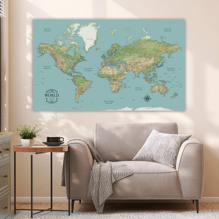a living room with a couch and a map on the wall