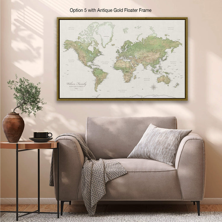 a living room with a couch and a map on the wall