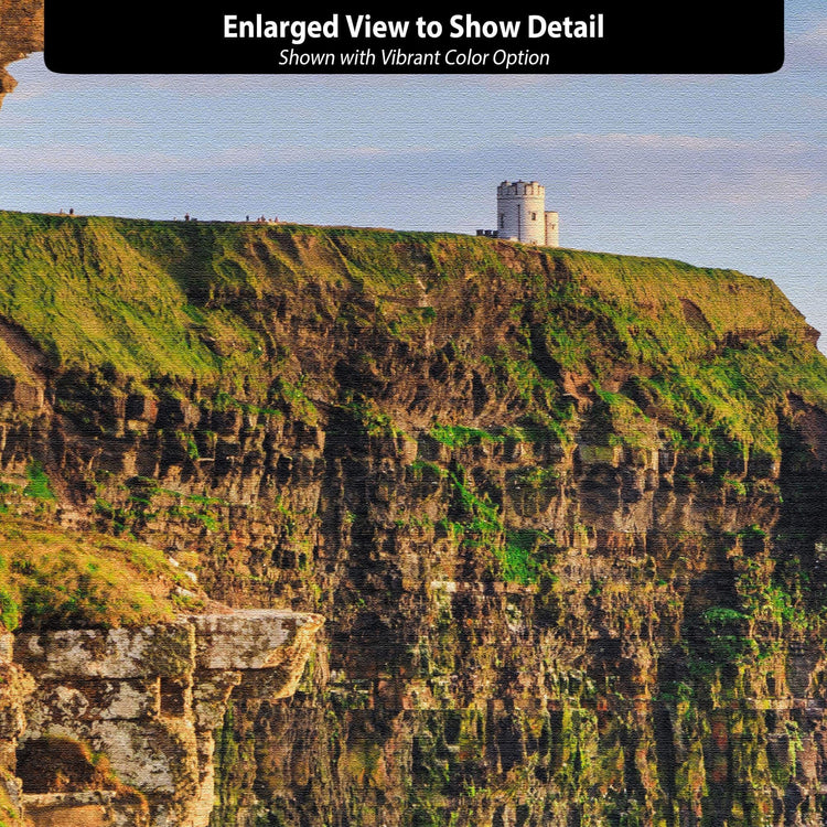 a large cliff with a tower on top of it