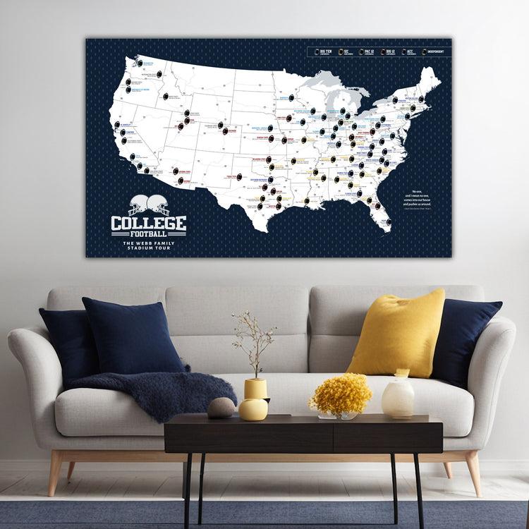 a large map of the United States with various locations marked, and a cozy living room setting with a couch, coffee table, and decorative items.