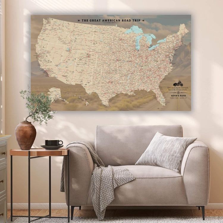 a living room with a couch and a map on the wall