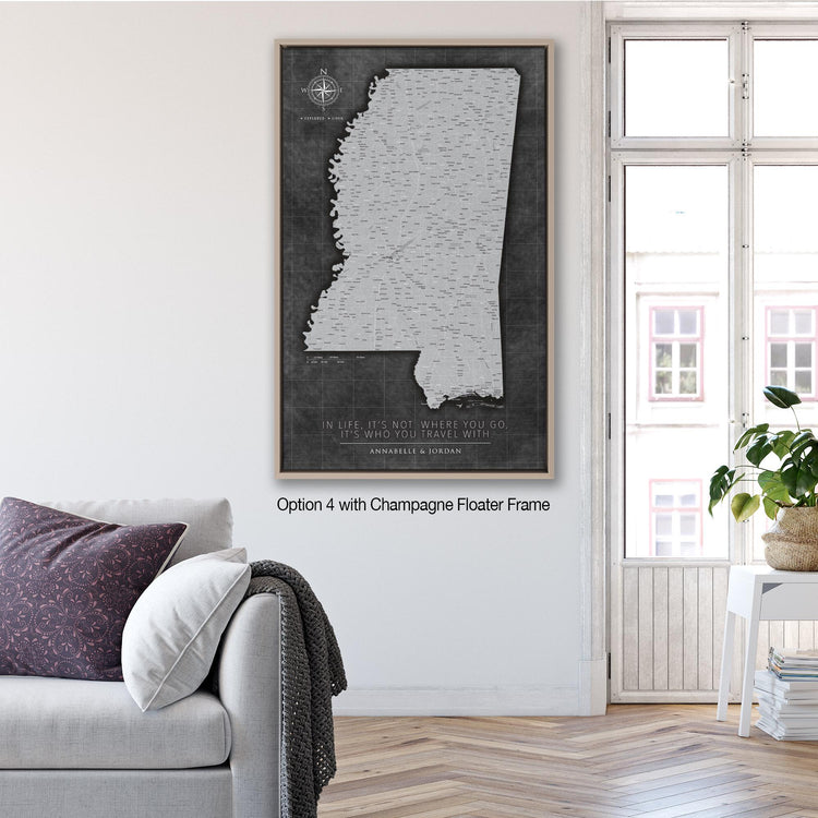 a living room with a couch and a painting on the wall