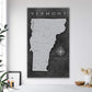a black and white map of vermont on a wall