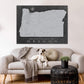 a dog sitting on a couch in a living room