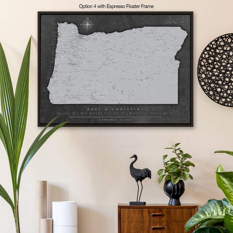 a black and white map of oregon hangs on a wall